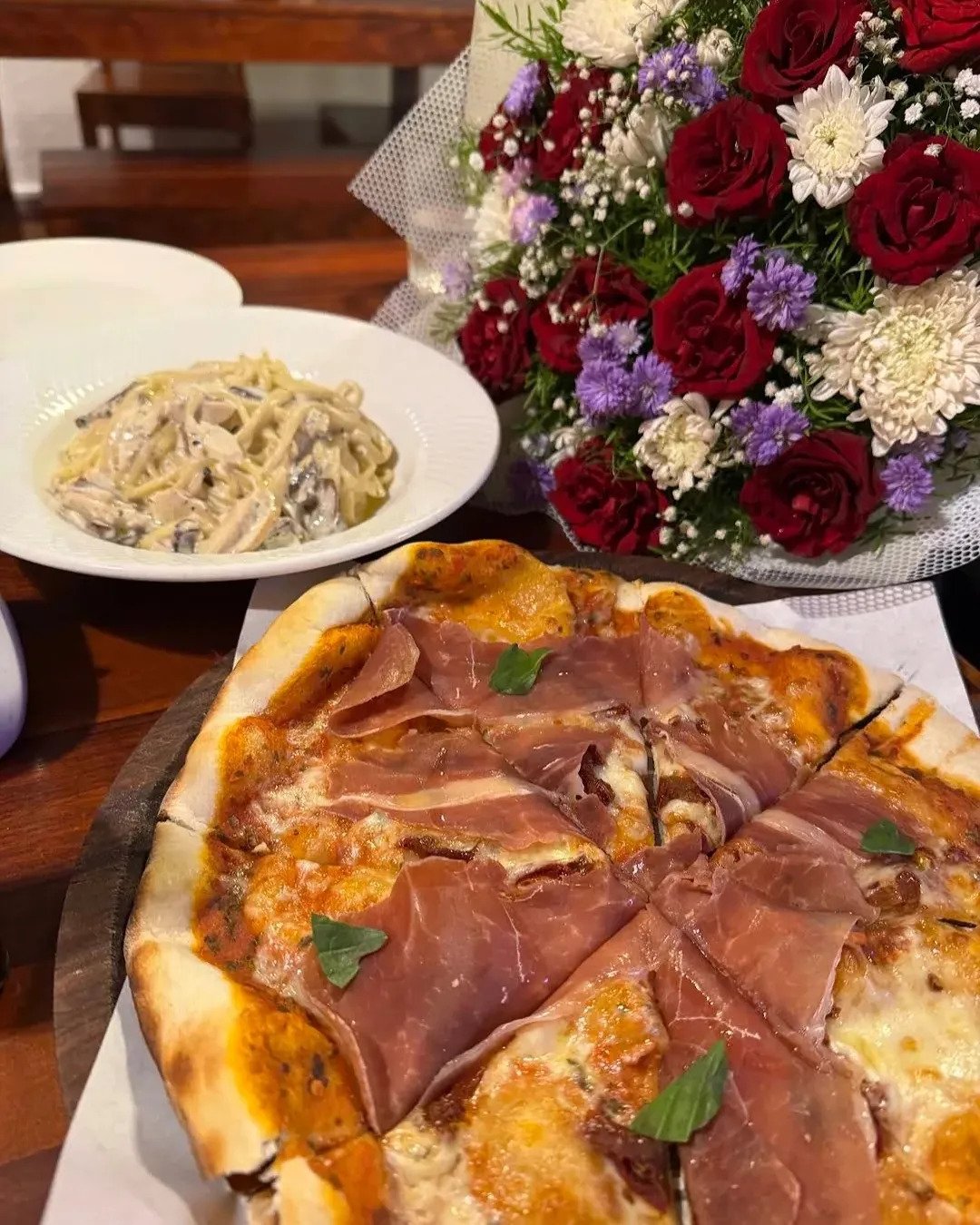 Authentic fresh baked artisan pizza at Roy's Pizzeria